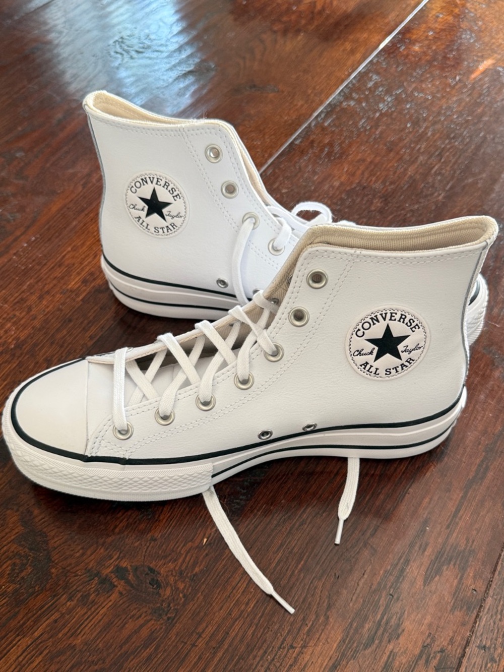 Converse White High-Top All Star Sneakers with Black Trim